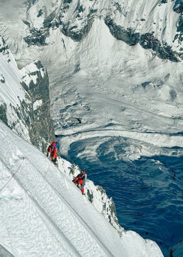 Reaching the last part of the south face of Numbur pic. Herve Barmasse Reaching the last part of the south face of Numbur pic. Herve Barmasse